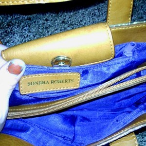 NICE FLORAL DESIGN SONDRA ROBERTS PURSE is being swapped online for free