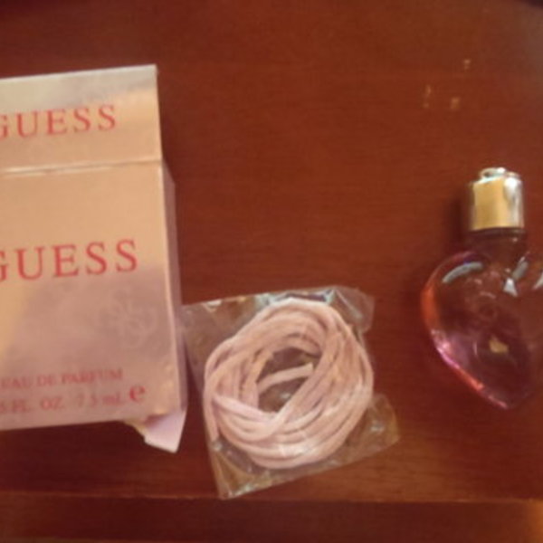 new guess perfume necklace  is being swapped online for free