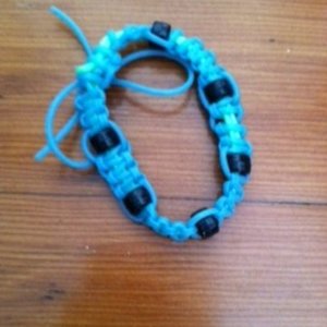 blue/green/black scooby bracelet is being swapped online for free
