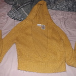 gold-orange sweater is being swapped online for free