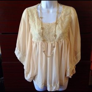 Sans Soucie boho top M is being swapped online for free