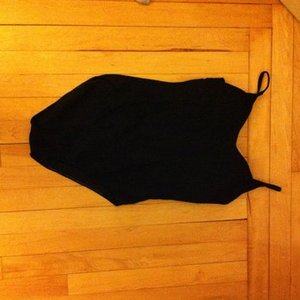 Black one piece bathing suit  is being swapped online for free