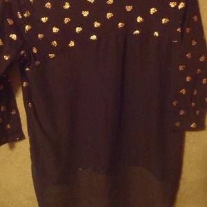 NEXT ERA COUTURE SHEER BACK SKULL SHIRT  is being swapped online for free