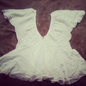 pretty white blouse flowy flutter sleeves small spring/summer fashion eyelet details is being swapped online for free