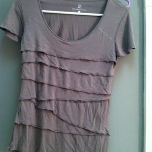 Express Ruffle Grey Shirt is being swapped online for free