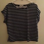 Tightrope stripey t-shirt is being swapped online for free