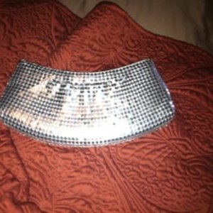 Silver sequined clutch is being swapped online for free