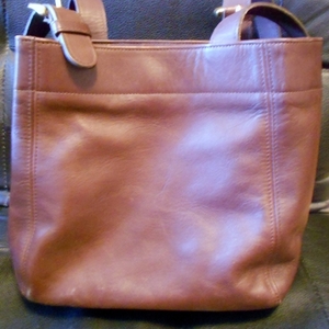 Coach Purse Authentic Vintage Leather Soho Tote Bag is being swapped online for free