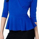 New blue Peplum top is being swapped online for free