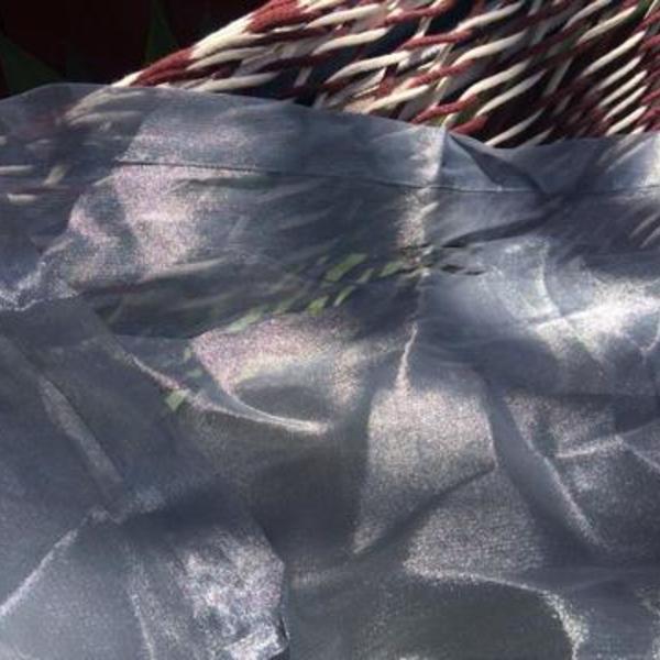 2 long sheer silver Curtain Panels is being swapped online for free
