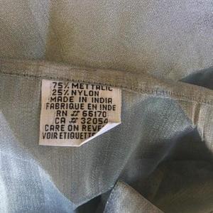 2 long sheer silver Curtain Panels is being swapped online for free