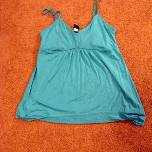 moda international blue babydoll top small is being swapped online for free