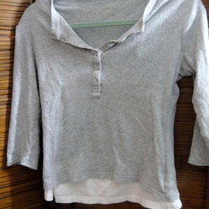 Cute grey & white top is being swapped online for free