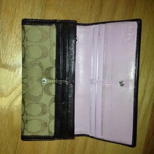 Authentic C Coach large brown wallet  is being swapped online for free