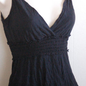  	 Twenty one Forever 21 black top tank S is being swapped online for free