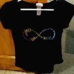 Size medium love infinity tee is being swapped online for free