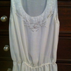 Charlotte Russe white beaded top size S is being swapped online for free