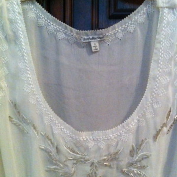 Charlotte Russe white beaded top size S is being swapped online for free
