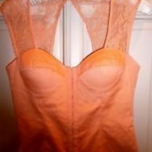 Elegant Peach/orange Corset top S is being swapped online for free