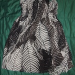 Black and white top. Size 2 is being swapped online for free