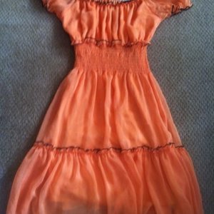 Cute orange dress Sz Sm is being swapped online for free