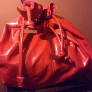Red slouch bag is being swapped online for free