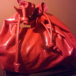 Red slouch bag is being swapped online for free