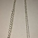 H rhinestone necklace is being swapped online for free