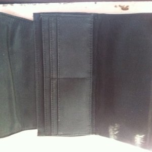 Pewter-toned wallet is being swapped online for free