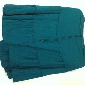 Bohemian/gypsy knee-length turquoise skirt is being swapped online for free
