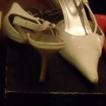 White strappy pumps size 9 M is being swapped online for free