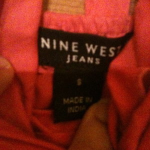 Nine West Pink Ruffle Wrap Halter Dress is being swapped online for free