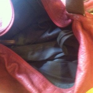 REPLICA Prada huge red handbag is being swapped online for free