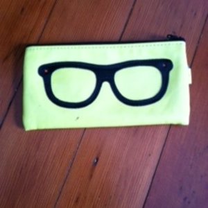 yellow glasses zipper bag is being swapped online for free