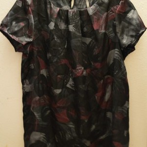 Flowy grey/black/red design blouse Sz. M is being swapped online for free