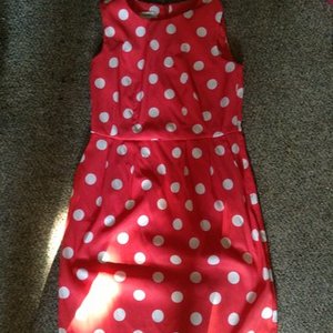 Orange and white polka dot dress is being swapped online for free