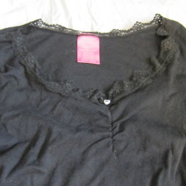 Black top with lace neck is being swapped online for free