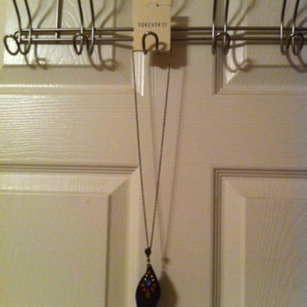 Forever 21 long necklace with jeweled feather pendant - brand new is being swapped online for free