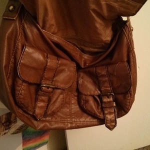 Brown leather tilly's satchel purse is being swapped online for free