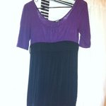 purple and black dress is being swapped online for free