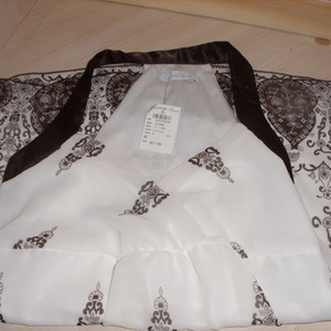 Brown and White Top is being swapped online for free