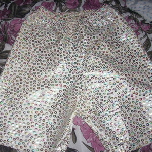sequined-like lycra bermudas is being swapped online for free