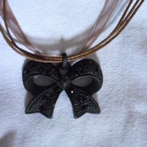 Black bow necklace is being swapped online for free
