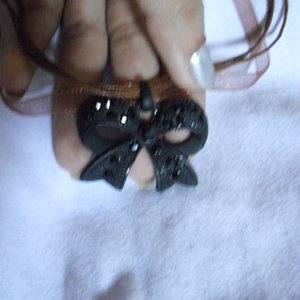 Black bow necklace is being swapped online for free