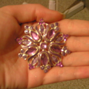 Purple Brooch is being swapped online for free