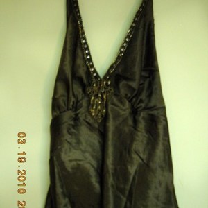 Silky Brown Halter Top Sz L-XL is being swapped online for free