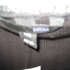 Black H&M Shrug  is being swapped online for free