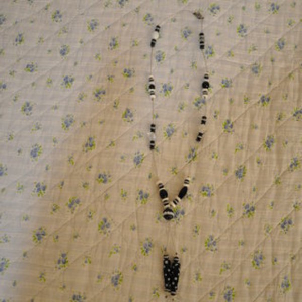 Black and white handmade necklace is being swapped online for free