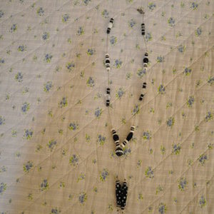Black and white handmade necklace is being swapped online for free