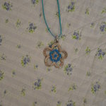 Turquoise flower necklace is being swapped online for free